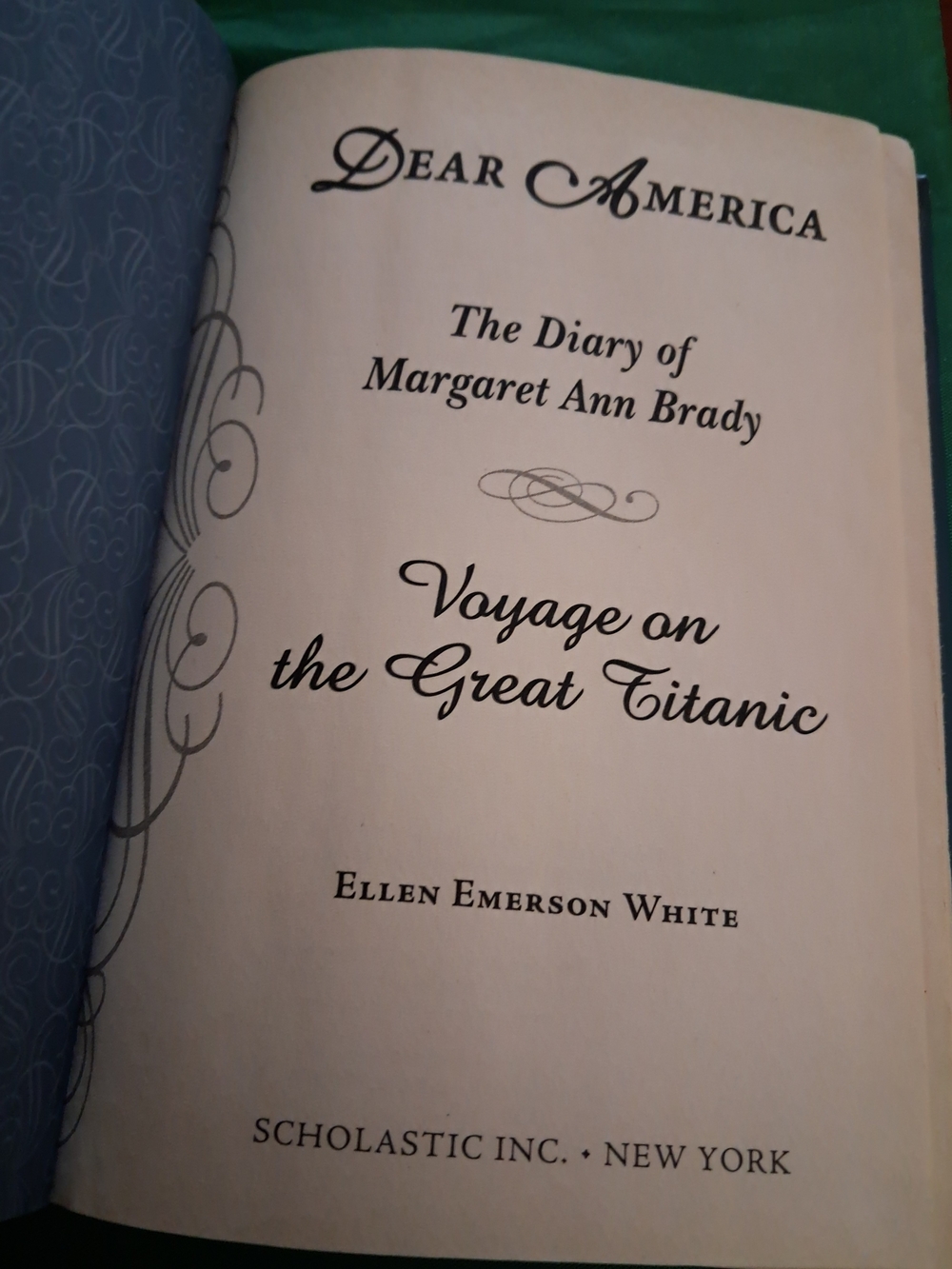 Scholastic Hardcover with Blue Cover and Gold Decorative Accents - Picture 3 of 4
